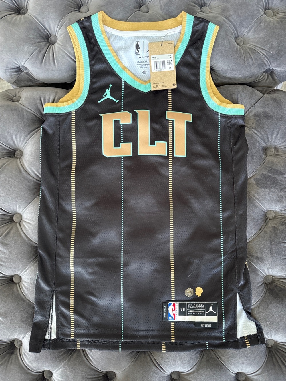 NBA Black Jersey with Gold & Teal Stripe Accents